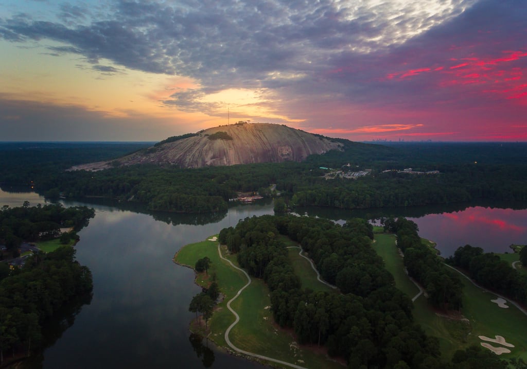 Aerial view of Stone Mountain and the lake at sunset